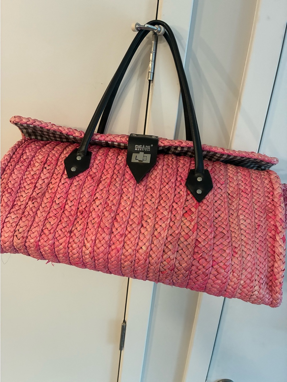Woven Pink large Tote Bag with Black Handles.